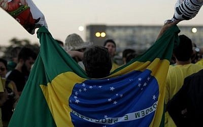 Activists supporting the impeachment of Brazilian President Dilma Rousseff demonstrate in front of the National Congress in Brasilia, on April 16, 2016. (AFP PHOTO / BETO BARATA)