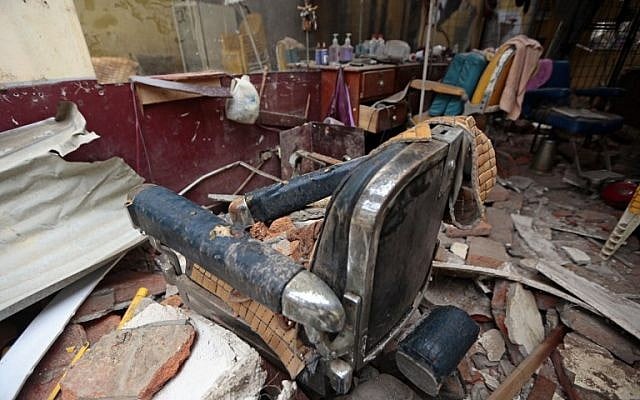 View of rubble at a hair salon after a 7.8-magnitude quake in Portoviejo, Ecuador on April 17, 2016. (AFP PHOTO / JUAN CEVALLOS)