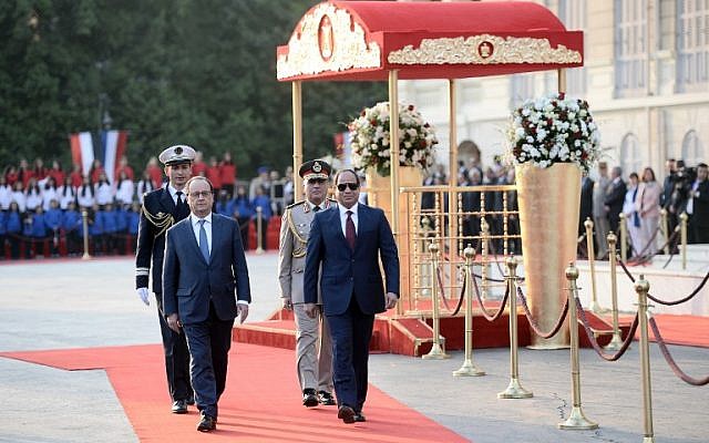 French President Francois Hollande (L) and his Egyptian counterpart Abdelfattah al-Sisi review the honour guard during a welcome ceremony at the al-Qubaa presidential palace in Cairo on April 17, 2016.(AFP PHOTO / STEPHANE DE SAKUTIN) French President Francois Hollande (L) and his Egyptian counterpart Abdelfattah al-Sisi review the honour guard during a welcome ceremony at the al-Qubaa presidential palace in Cairo on April 17, 2016.(AFP PHOTO / STEPHANE DE SAKUTIN)