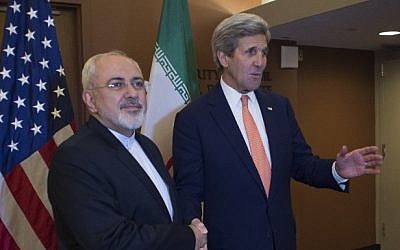 US Secretary of State John Kerry (right) poses for a photo opportunity prior to a meeting with Iran's Foreign Minister Mohammad Javad Zarif (left) at the UN in New York, April 19, 2016. (AFP/Don Emmert)