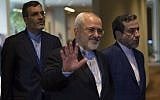 Iran's Foreign Minister Mohammad Javad Zarif, center, arrives for a meeting with US Secretary of State John Kerry April 19, 2016, at the United Nations in New York. (AFP / DON EMMERT)