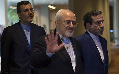 Iran's Foreign Minister Mohammad Javad Zarif, center, arrives for a meeting with US Secretary of State John Kerry April 19, 2016, at the United Nations in New York. (AFP / DON EMMERT)