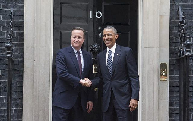Britain's Prime Minister David Cameron (L) and US President Barack Obama (R) shake hands on the step outside 10 Downing Street as Obama arrives for talks in central London on April, 22, 2016. (AFP PHOTO / JUSTIN TALLIS)