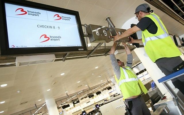 Workers operate inside the departure hall at Brussels airport on April 22, 2016. (AFP/Pool/Virginie Lefour) Workers operate inside the departure hall at Brussels airport on April 22, 2016. (AFP/Pool/Virginie Lefour)