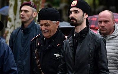Far-right militants march during a rally to celebrate the life and the death of Italian dictator Benito Mussolini in Predappio, on April 24, 2016.(AFP PHOTO / TIZIANA FABI)
