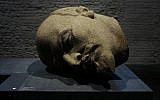 The head of a 19-meter high statue of former Soviet leader Vladimir Lenin is on display at the permanent exhibition "Unveiled. Berlin and its Monuments" in Berlin's Spandau Citadel museum. (AFP/John MacDougall)