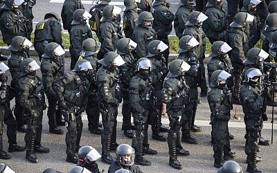 Policemen stand near the venue of a party congress of the German right-wing party AfD (Alternative fuer Deutschland) at the Stuttgart Congress Centre ICS on April 30, 2016 in Stuttgart, southern Germany. (AFP/Philipp Guelland) Policemen stand near the venue of a party congress of the German right-wing party AfD (Alternative fuer Deutschland) at the Stuttgart Congress Centre ICS on April 30, 2016 in Stuttgart, southern Germany. (AFP/Philipp Guelland)