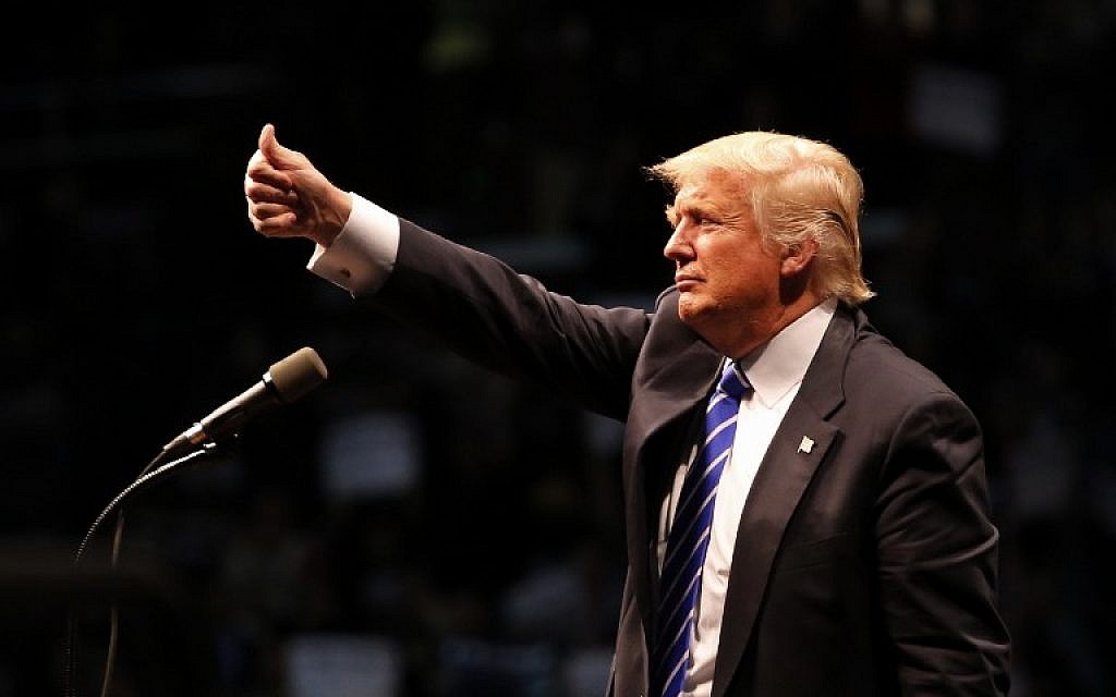 Republican presidential candidate Donald Trump gives a thumbs up to supporters after speaking at a campaign rally on April 11, 2016 in Albany, New York. Alvarez/Getty Images/AFP Republican presidential candidate Donald Trump gives a thumbs up to supporters after speaking at a campaign rally on April 11, 2016 in Albany, New York. Alvarez/Getty Images/AFP