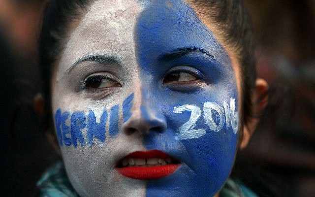 A woman at a rally for Democratic Presidential candidate Bernie Sanders in New York City's historic Washington Square Park on April 13, 2016 in New York City. (Spencer Platt/Getty Images/AFP) A woman at a rally for Democratic Presidential candidate Bernie Sanders in New York City's historic Washington Square Park on April 13, 2016 in New York City. (Spencer Platt/Getty Images/AFP)