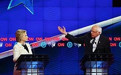 Democratic Presidential candidates Hillary Clinton, right, and Sen. Bernie Sanders debate during the CNN Democratic Presidential Primary Debate at the Duggal Greenhouse in the Brooklyn Navy Yard on April 14, 2016 in New York City. (Justin Sullivan/Getty Images/AFP)