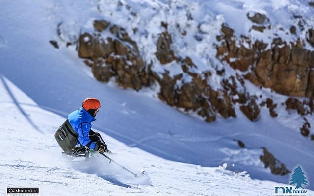 Israelis with disabilities participate in the Erez Foundation ski and snowboard program (Erez Foundation, a search & rescue and contribution to the community/Courtesy)