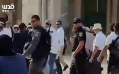 Jews visit the Temple Mount under police protection on April 27, 2016 (Screen capture: Facebook)