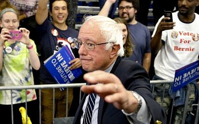 Democratic presidential candidate Sen. Bernie Sanders, I-Vt., waves as he leaves a campaign rally at Fitzgerald Fieldhouse on the University of Pittsburgh campus, Monday, April 25, 2016, in Pittsburgh. (AP/Keith Srakocic)