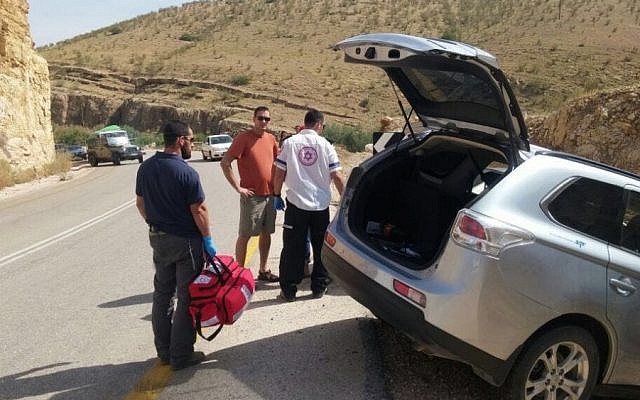 Medical emergency services surround a car after a crash in the Jordan Valley on April 24, 2016. (MDA)