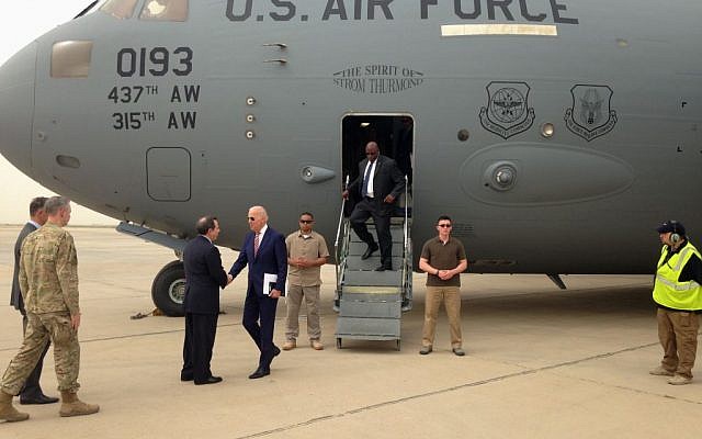 US Vice President Joe Biden is greeted by US Ambassador Stuart Jones after stepping off a C-17 military transport plane upon his arrival in Baghdad, Iraq, April 28, 2016. (AP/Josh Lederman) US Vice President Joe Biden is greeted by US Ambassador Stuart Jones after stepping off a C-17 military transport plane upon his arrival in Baghdad, Iraq, April 28, 2016. (AP/Josh Lederman)