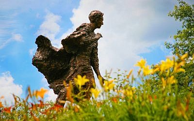 A statue of Louis D. Brandeis by Robert Berks, unveiled in 1956, sits atop a hill on the Brandeis University campus. (Mike Lovett, Brandeis University photographer)
