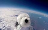 Sam the cuddly toy dog flies high in the sky after taking off from Morecambe, England Tuesday April 5, 2016 attached to a special camera and a helium balloon. Sending the toy dog into the sky was part of a science project by Morecambe Bay Community Primary School which joined forces with a local hotel . The toy dog reached an altitude of 12 miles above the earth's surface. (Morecambe Bay Community Primary School and English Lakes Hotels Resorts & Venues via AP)