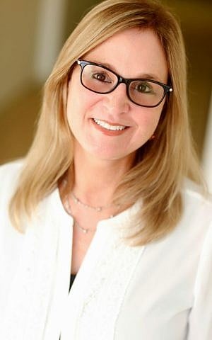 Rachelle Nelson received her ordination online but for now is staying in her position as a cantor. She may pursue a rabbinical pulpit in retirement. (Courtesy of Temple Beth Am/via JTA)