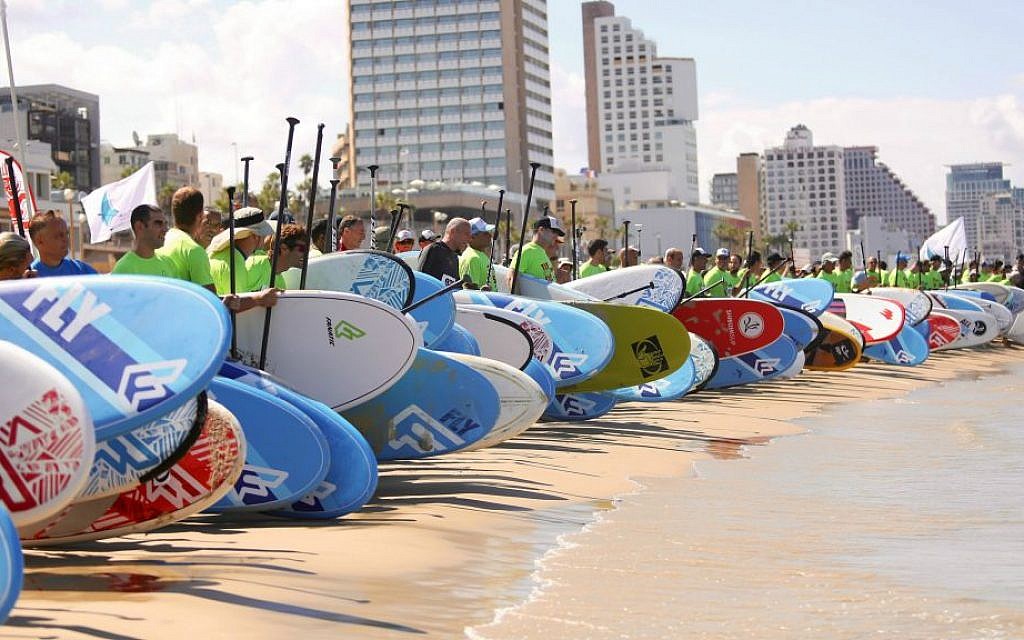 Paddle-boarders lining up for Tel Aviv's now-annual seaside competition, taking place this year on Thursday, April 28 (Courtesy Efrat Saar) Paddle-boarders lining up for Tel Aviv's now-annual seaside competition, taking place this year on Thursday, April 28 (Courtesy Efrat Saar)