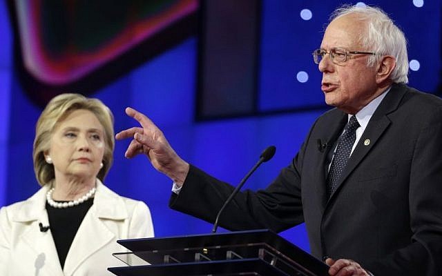 Democratic presidential candidate Sen. Bernie Sanders, right, speaks as Hillary Clinton listens during the CNN Democratic Presidential Primary Debate at the Brooklyn Navy Yard on Thursday, April 14, 2016 in New York. (AP Photo/Seth Wenig) Democratic presidential candidate Sen. Bernie Sanders, right, speaks as Hillary Clinton listens during the CNN Democratic Presidential Primary Debate at the Brooklyn Navy Yard on Thursday, April 14, 2016 in New York. (AP Photo/Seth Wenig)