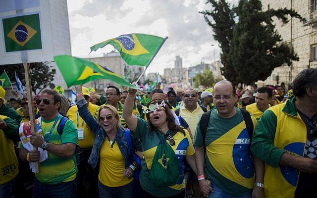 Thousands of Brazilian Christian Evangelists wave their national flag as they march in the Feast of the Tabernacles parade in Jerusalem, October 14, 2014. (Yonatan Sindel/Flash90) Thousands of Brazilian Christian Evangelists wave their national flag as they march in the Feast of the Tabernacles parade in Jerusalem, October 14, 2014. (Yonatan Sindel/Flash90)