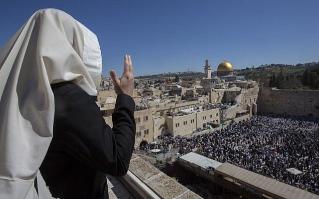 Jewish worshipers pray in front of the Western Wall, in Jerusalem's Old City, during Passover, April 6, 2015. The Western Wall is a retaining wall of the Temple Mount, Judaism's holiest site. (Yonatan Sindel/Flash90) Jewish worshipers pray in front of the Western Wall, in Jerusalem's Old City, during Passover, April 6, 2015. The Western Wall is a retaining wall of the Temple Mount, Judaism's holiest site. (Yonatan Sindel/Flash90)