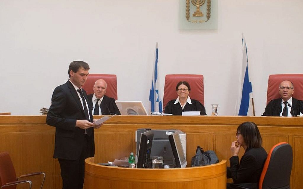 Supreme Court Justice Esther Hayut (C) sits with Justice Noam Sohlberg (R) and Justice Uzi Fogelman during a court hearing for Meir Ettinger at the Supreme Court in Jerusalem on April 4, 2016. (Yonatan Sindel/Flash90)