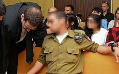 An Israeli soldier who shot a Palestinian assailant in Hebron sits in a military court hearing in Tel Aviv, April 5, 2016. (Flash90)