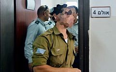 An Israeli soldier who shot a Palestinian terrorist in Hebron at a military court hearing in Jaffa on April 7, 2016. (Flash90)