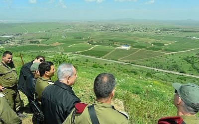 Benjamin Netanyahu is seen during a security tour in the Golan Heights, near Israel's northern border with Syria, on April 11, 2016. (Kobi Gideon/GPO)