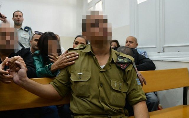 The Israeli soldier who shot a Palestinian assailant in Hebron arrives for a court hearing at a military court in Jaffa, April 14, 2016. (Flash90) The Israeli soldier who shot a Palestinian assailant in Hebron arrives for a court hearing at a military court in Jaffa, April 14, 2016. (Flash90)