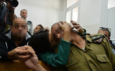 The Israeli soldier who shot a Palestinian terrorist in Hebron arrives for a court hearing at a military court in Jaffa, April 14, 2016. (Flash90)