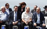Benjamin Netanyahu, front row, right, poses for a group picture with his government at a cabinet meeting in the Golan Heights on April 17, 2016. Effi Sharir/POOL)