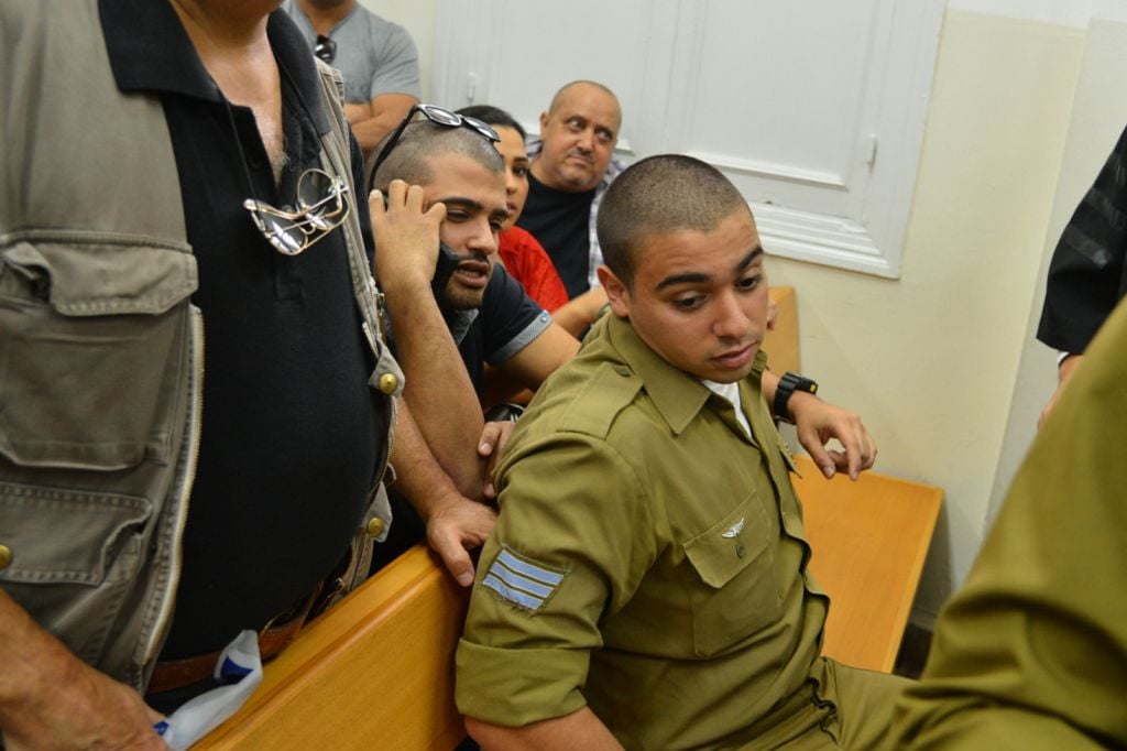 Sgt. Elor Azaria, the Israeli soldier who shot dead a disarmed Palestinian terrorist in Hebron last month, arrives for a court hearing at Jaffa Military Court on April 18, 2016. (Flash90) Sgt. Elor Azaria, the Israeli soldier who shot dead a disarmed Palestinian terrorist in Hebron last month, arrives for a court hearing at Jaffa Military Court on April 18, 2016. (Flash90)