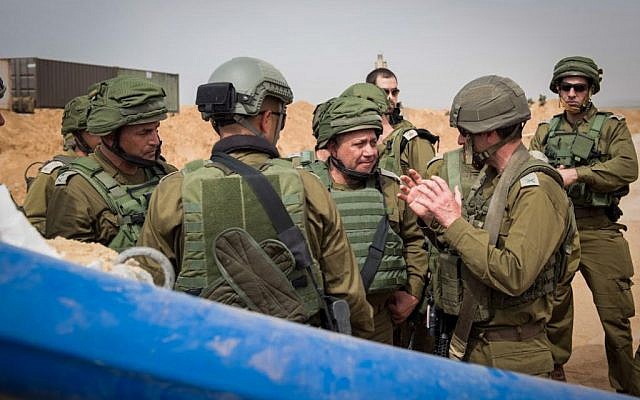 IDF Chief of Staff Gadi Eisenkot, center, and head of the Southern Command, Maj. Gen. Eyal Zamir, left, inspect a newly discovered 'terror tunnel,' believed to have been dug by Hamas terrorists from the Gaza Strip into southern Israel, on April 18, 2016. (IDF Spokesperson/FLASH90)