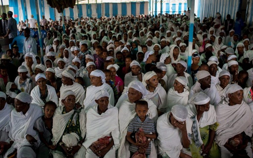 Members of the Jewish Ethiopian community wait for prayer service before attending the Passover seder meal, in the synagogue in Gondar, Ethiopia, April 22, 2016. (Miriam Alster/FLASH90)