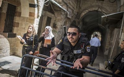 Israeli police guard at an entrance to the Temple Mount in Jerusalem's Old City, during the Jewish holiday of Passover on April 24, 2016. (Hadas Parush/Flash90)