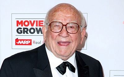 In this Feb. 8, 2016 file photo, actor Ed Asner arrives at the 15th Annual Movies for Grownups Awards in Beverly Hills, Calif. Asner will team up with actress Jayne Atkinson to read “The Soap Myth” at the New York Public Library for the Performing Arts at Lincoln Center in honor of Holocaust Remembrance Day. (Photo by Rich Fury/Invision/AP, File)