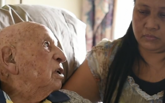 Holocaust survivor Richard Roberts being interviewed recently with his caregiver, Elenita Fernandez, in Sydney, Australia. (Screenshot via JTA) Holocaust survivor Richard Roberts being interviewed recently with his caregiver, Elenita Fernandez, in Sydney, Australia. (Screenshot via JTA)