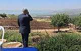Prime Minister Benjamin Netanyahu speaks on the phone during a weekly cabinet meeting held on the Golan Heights, April 17, 2016. (Moav Vardi)