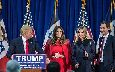Republican presidential candidate Donald Trump standing on with his wife Melania Trump, daughter Ivanka Trump and son-in-law Jared Kushner (left to right) at a campaign rally at the Ramada Waterloo Hotel and Convention Center in Waterloo, Iowa, February 1, 2016. (Brendan Hoffman/Getty Images, via JTA)