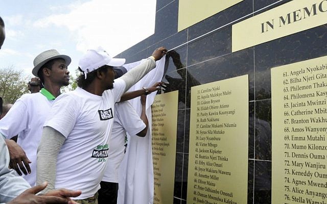 Students check names on the memorial plaque at Garissa University, in Garissa, Kenya, Saturday, April 2, 2016. (AP Photo/Kevin Midigo) Students check names on the memorial plaque at Garissa University, in Garissa, Kenya, Saturday, April 2, 2016. (AP Photo/Kevin Midigo)