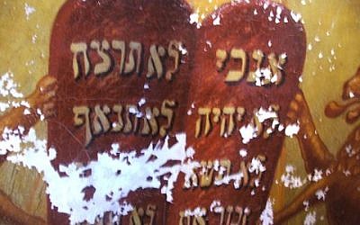 This image shows the extent of damage to the Ten Commandments. (Courtesy/Lost Shul Mural Project)