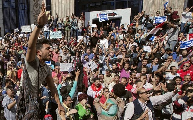 Egyptians shout slogans against Egyptian President Abdel-Fattah el-Sissi during a protest against the decision to hand over control of two strategic Red Sea islands to Saudi Arabia in front of the Press Syndicate, in Cairo, Egypt, April 15, 2016. (AP/Amr Nabil) Egyptians shout slogans against Egyptian President Abdel-Fattah el-Sissi during a protest against the decision to hand over control of two strategic Red Sea islands to Saudi Arabia in front of the Press Syndicate, in Cairo, Egypt, April 15, 2016. (AP/Amr Nabil)
