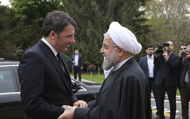 Iran's President Hassan Rouhani welcomes Italian Prime Minister Matteo Renzi during an official arrival ceremony at the Saadabad Palace in Tehran, Iran, April 12, 2016. (Iranian Presidency Office via AP) Iran's President Hassan Rouhani welcomes Italian Prime Minister Matteo Renzi during an official arrival ceremony at the Saadabad Palace in Tehran, Iran, April 12, 2016. (Iranian Presidency Office via AP)