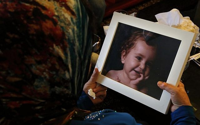 Lebanese Ibtissam Berri holds a picture of her granddaughter Lahela al-Amin as she speaks during an interview with The Associated Press, at her home in the southern suburbs of Beirut, Lebanon, Thursday, April 7, 2016. (AP Photo/Bilal Hussein) Lebanese Ibtissam Berri holds a picture of her granddaughter Lahela al-Amin as she speaks during an interview with The Associated Press, at her home in the southern suburbs of Beirut, Lebanon, Thursday, April 7, 2016. (AP Photo/Bilal Hussein)