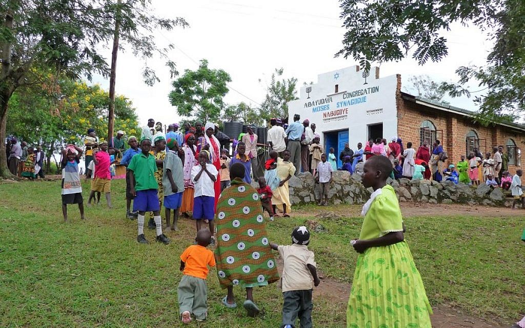 Members of Uganda’s Abayudaya Jewish community outside a synagogue in Nabagoye. (Courtesy of Be'chol Lashon)