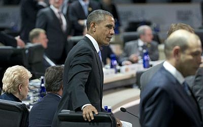 President Barack Obama takes his seat with other world leaders for the afternoon plenary session of the Nuclear Security Summit, Friday, April 1, 2016, in Washington. (AP/Alex Brandon)