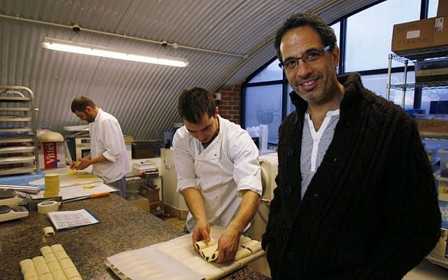 Israeli chef Yotam Ottolenghi poses at his company's bakery in London on December 12, 2012. (AP/Lefteris Pitarakis)