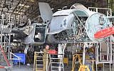 An IAF airman works on an F-15 at the Air Forces' AMU (IAF)